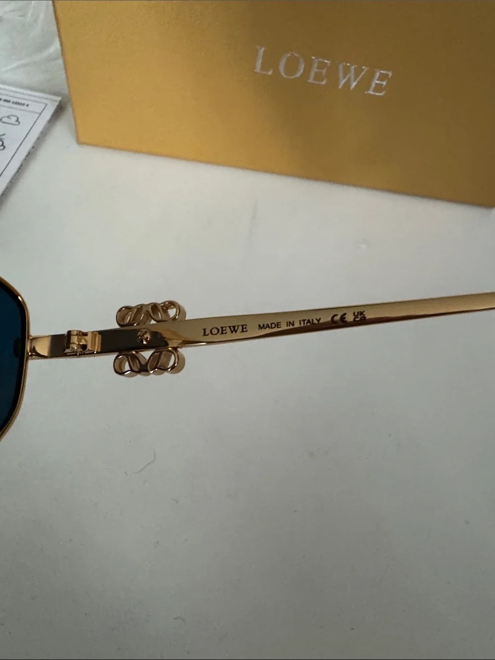 Loewe Gold Frame Sunglasses with Orange-Gold Mirrored Lenses